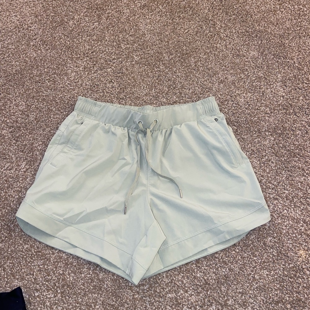 Light green athletic shorts